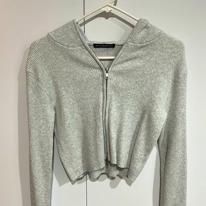 Cute and soft cropped Heather gray zip up cardigan from brandy Melville